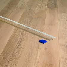 Be sure to always follow the manufacturer's instructions when if the thickness of the underlay, laminate flooring and threshold bar will stop a door opening into the room, the door must be removed and trimmed. Trims And Profiles Flooringsupplies Co Uk