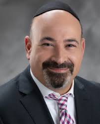 Decades of Holding Keys to City Hall's Smooth Operations