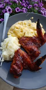 As the gravy is reducing, prepare the potatoes by combining the water, milk, butter, and salt in a medium saucepan over medium heat. Bbq Wings Mac N Cheese And Mashed Potatoes Dining And Cooking