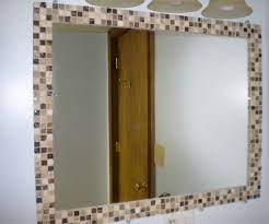 If you cannot find a mirror with a frame that fits your project, you can buy a piece of wood and glue a regular mirror to its surface. Diy Mosaic Tile Mirror Border Use Tile Strips Need To Do This In The Bathroom Diy Vanity Mirror Diy Vanity Mirror With Lights Bathroom Mirror Frame