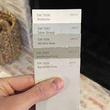 Our first choice was sw amazing gray 7044 hardie plank with sw functional gray 7024 beams and sw intellectual gray 7045 for the trim on our windows and under the peaks. Paint Colors Mindfully Gray