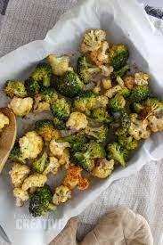 Easy Oven Roasted Broccoli And Cauliflower Recipe Roasted Brocolli And Cauliflower Roast Broccoli And Cauliflower Brocolli And Cauliflower Recipes