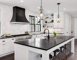 You can see the kitchen becomes more busy, yet colorful. Black Countertops And White Cabinets Maestro Surfaces Facebook