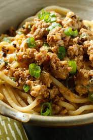 This Recipe For Spicy Peanut Noodles Is Adapted From Ken Hom The Chef And Cookbook Author Best Known For His Bbc Television Recipes Nyt Cooking Asian Recipes