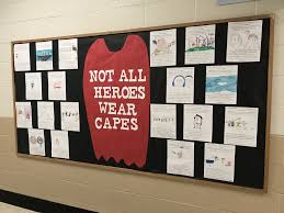 Heroes Bulletin Board Idea Not All Heroes Wear Capes Students Learned About Different Types O Hero Bulletin Board Hero Classroom Theme Summer Bulletin Boards