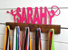 Oct 11, 2014 · in 2012 the women's gymnastics team won the second ever gold medal in the team competition for the united states. Personalized Rhythmic Gymnastics Medal Holder Pinecone Home