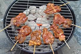 Venders often sell them with sticky rice and tamarind dipping sauce. Thai Grilled Pork On A Skewer With Sticky Rice Khao Niaow Moo Ping The High Heel Gourmet