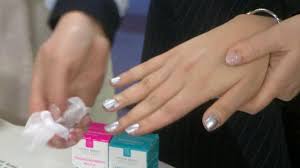 Nail polishes and different nail kits. Nail Salon Etiquette How Much Should You Tip