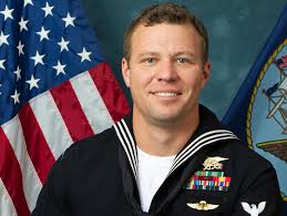 U.S. Navy SEAL Christopher J. Chambers, 37, a Westfield High School  graduate and state champ in swimming, died Jan. 11 while trying to save a  comrade who had fallen into the Arabian