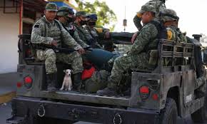 A vandal — вандал — deliberately causes damage to property. Mexican Troops Seized By Villagers After Guatemalan Man Killed At A Checkpoint Mexico The Guardian