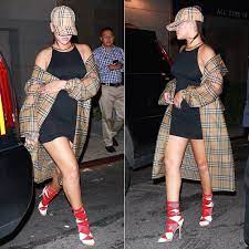 Rihanna In Burberry Check Pvc Trench Coat Haus Of Rihanna Outfits With Hats Rhianna Style Burberry Cap
