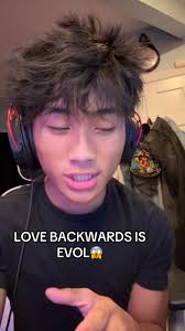 Love Backwards Is Evil Tattoo