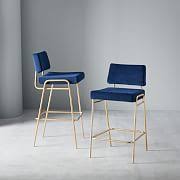 Standing on a sturdy metal frame, its curved seat and back offer a comfy place to sit and linger. Counter Height Stools