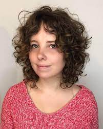The 16 Cutest Examples Of Naturally Curly Hair With Bangs Curly Hair With Bangs Medium Length Curly Hair Curly Hair Styles
