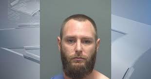 Janesville police rescue man who jumped in Rock River while running away