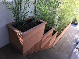 The shape helps to complement your home and makes a good contrast to traditional round planters. Containers Planter Boxes For Bamboo Bamboo Sourcery Nursery Gardens