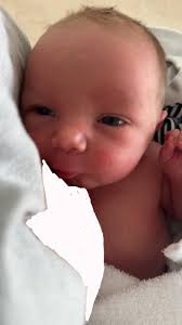 What is the purpose of the white blanket in outdoor photography sessions?