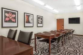 A rich, dark finish accented with satin nickel color hardware adorns this entertainment center creating the perfect example of contemporary furniture. Ramada By Wyndham Carlyle Carlyle Sk Hotels