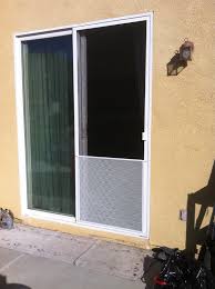 Help preserve the life of your screen door with this pet grille. White Sliding Screen Door Installed With Pet Grill Murrieta Ca Mobile Screen Shop