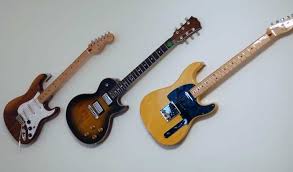 .to hang my guitars up on the wall, but drilling wall mounts into the drywall is not possible and i have no idea where the studs are (or if they in a good placement to i just put up three. Ultimate Diy Guide To Hanging A Guitar On The Wall Guitar Gear Finder