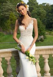 This Wedding Gown Is Made For The Minimalist Looking For Some Extra Glam On Her Big Day With Its Plu Wedding Dresses Classic Wedding Dress Crepe Wedding Dress