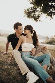 Cute And Warm Couple Session Romantic Engagement Session In Field Casual Outfits For Eng Couple Photoshoot Poses Couple Picture Poses Photo Poses For Couples