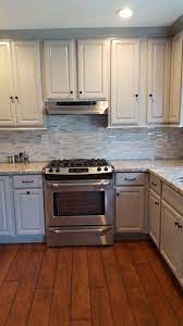 After I Decided To Go For Gray Cabinets I Chose Pebble Grey From Kraftmaid The Floor Is Grey Kitchen Cabinets Modern Grey Kitchen Kraftmaid Kitchen Cabinets