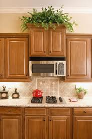 This way you can take this opportunity to add a few modern or industrial a classic kitchen design can use wood cabinetry in various elegant ways. Oak Cabinets Ideas On Foter