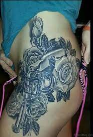 Gun and rose tattoo on thigh tattoo designs tattoo pictures. 72 Brilliant Gun Tattoos Design On Thigh