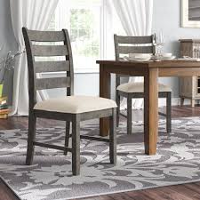 Be sure to have a look at our solid wood dining table category for a vast selection of tables in any style to match your chairs. Ash Gray Wood Kitchen Dining Chairs You Ll Love In 2021 Wayfair
