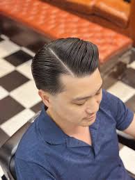 Barber Jonny may be one of our newest barbers but he is certainly skilled  with a great sense of style. Good service and a speciality in a great mid  fade. Talk all