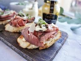 Cover large platter with watercress. Quick Roast Beef Crostini With Dijon Horseradish Sauce