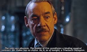 In Harry Potter and the Goblet of Fire (2005), Harry cannot exit the  Triwizard tournament as it constitutes a binding magical contract. This  implies literally every wizard in Hogwarts, including Dumbledore, is