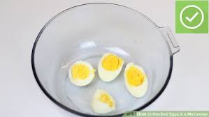 Remove the container of boiling water from the microwave and place the eggs carefully in the water. How To S Wiki 88 How To Boil Eggs In Microwave In Hindi