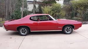 Image result for Matador Red 1969 Firebird