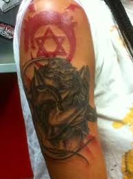 Here Is My Tattoo Of Alphonse Elric And An Ouroboros Sign An Ouroboros Represents Infinity Although It Was Branded On Humuncul Tattoos Ghibli Tattoo I Tattoo
