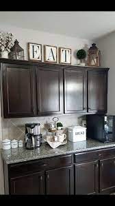Decorating above your kitchen cabinets is a great way to showcase favorite items and keep the supplies you need within reach. Over The Cabinet Decor Kitchen Decor Apartment Kitchen Cabinets Decor Rustic Kitchen Decor