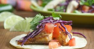 Seasoned broiled white fished topped with a quick and easy slaw is the perfect quick and easy weeknight dinner! Wow Your Cinco De Mayo Guests With These Yummy Broiled Fish Tacos With Chipotle Lime Dressing