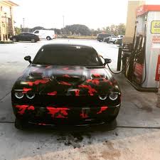 2020 Dodge Challenger Srt Hellcat Black And Red Check Out This Red Camo Hellcat Challenger At The Pumps Owned By Mikekobie Camo Car Hellcat Challenger Dodge Challenger Srt Hellcat
