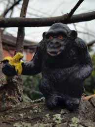 Gorilla, baby sitting with banana (AAA) – Animal Toy Blog