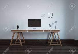This home office desk features two small drawers that open and close on smooth metal runners for easy access storage of supplies. Neat Workstation In A Minimalist Modern Office With A Desktop Stock Photo Picture And Royalty Free Image Image 98025244