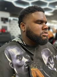 Natural haircut and beard services available