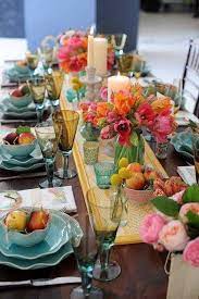 Served table with yellow tablecloth, easter cake and crockery in kitchen. Colourful And Happy Lunch Table Decorations Table Settings Beautiful Table Settings