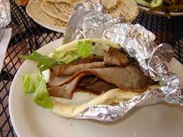 Pita Jungle Beef Gyro Broiled Beef Marinated With Spices And Herbs Served In A Greek Pita With Mixed Greens Tomatoes And Tsatziki Greek Pita Beef Gyro Food