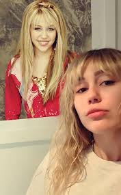 Miley Ray Cyrus added a new photo.