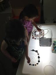 Light Table Mandalas With Various Materials We Ve Used Buttons Glass Beads Shells And Bottle Caps The Children Are Con Reggio Children Yoga For Kids Reggio