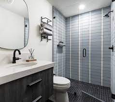We didn't cut into the closet to increase the bathroom space, but we did create a little jewel with a curbless shower. New This Week 5 Bathrooms With A Curbless Or Low Curb Shower
