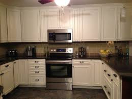 white kitchen cabinets with backsplash