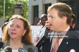 Emily Lyons and husband Jeff Lyons speak to reporters outside the... News  Photo
