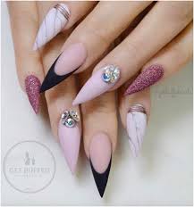 Stiletto nails are oval shaped nails that are more pointed than rounded at the tip, and are usually very long. Stiletto Nails Chic Cuties Blog